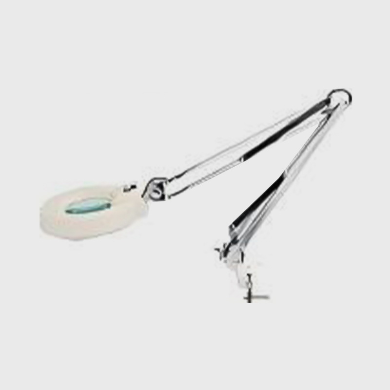 Увеличительное стекло для осмотра медицинского инструмента